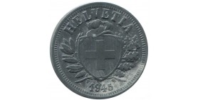 Avers : écusson de la Suisse devant un bouclier