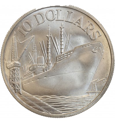 navire marchant à quai, grue et docks