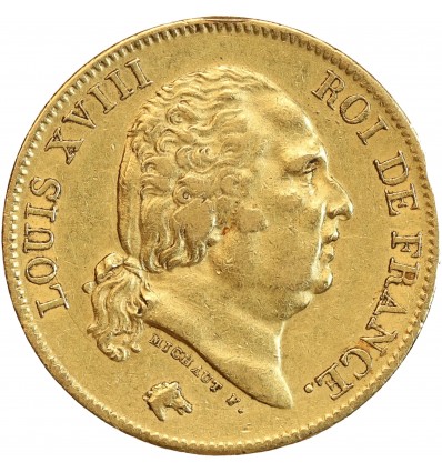 Avers : tête nue de Louis XVIII à droite