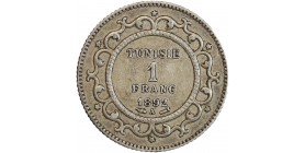 Avers : TUNISIE / 1 / FRANC / date dans un cercle d'entrelacs et d'étoiles