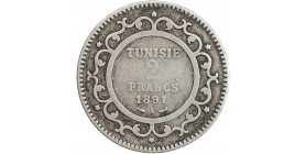 Avers : TUNISIE / 2 / FRANCS / date dans un cercle d'entrelacs et d'étoiles