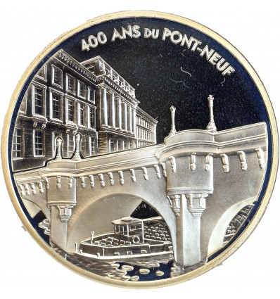 Revers : représentation du Pont-Neuf et du Palais Conti, bâtiement abritant la Monnaie de Paris