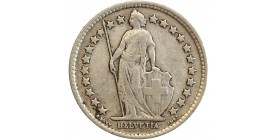 Avers : Helvetia debout vêtue d'une toge, appuyée contre un bouclier et tenant une lance