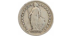 Avers : Helvetia debout tenant une lance et un bouclier