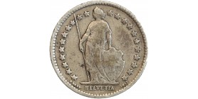 Avers : Helvetia debout vêtue d'une toge, appuyée contre un bouclier et tenant une lance