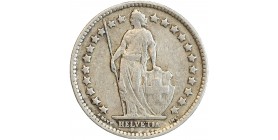 Avers : Helvetia debout vêtue d'une toge, appuyée contre un bouclier et tenant une lance