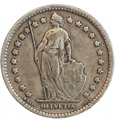 Avers : Helvetia debout tenant une lance et un bouclier