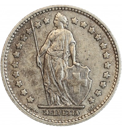 Avers : Helvetia debout tenant une lance et un bouclier