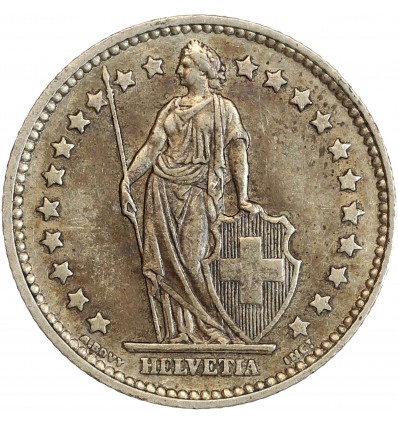 Avers : Helvetia debout tenant une lance et un bouclier