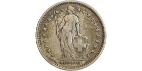 Avers : Helvetia debout vêtue d'une toge, appuyée contre un bouclier et tenant une lance