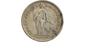 Avers : Helvetia debout vêtue d'une toge, appuyée contre un bouclier et tenant une lance