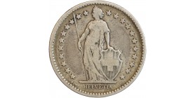 Avers : Helvetia debout vêtue d'une toge, appuyée contre un bouclier et tenant une lance