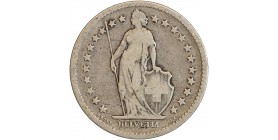 Avers : Helvetia debout vêtue d'une toge, appuyée contre un bouclier et tenant une lance