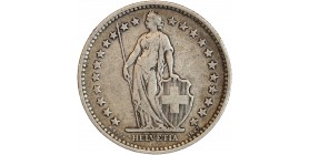 Avers : Helvetia debout vêtue d'une toge, appuyée contre un bouclier et tenant une lance