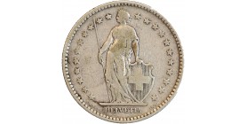 Avers : Helvetia debout vêtue d'une toge, appuyée contre un bouclier et tenant une lance