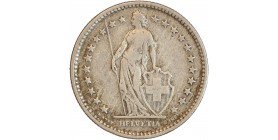 Avers : Helvetia debout vêtue d'une toge, appuyée contre un bouclier et tenant une lance