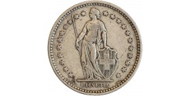 Avers : Helvetia debout vêtue d'une toge, appuyée contre un bouclier et tenant une lance