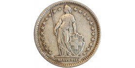 Avers : Helvetia debout vêtue d'une toge, appuyée contre un bouclier et tenant une lance