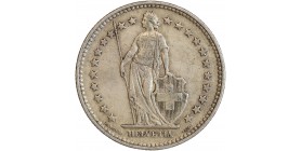 Avers : Helvetia debout vêtue d'une toge, appuyée contre un bouclier et tenant une lance