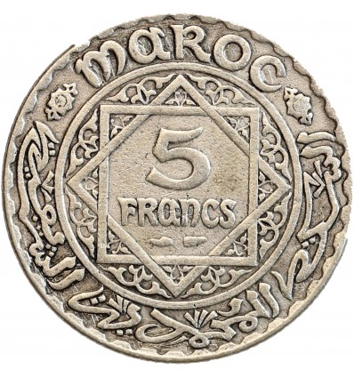 Avers : date dans des entrelacs et arabesques