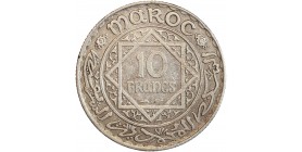 Avers : date dans des entrelacs et arabesques