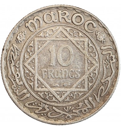 Avers : date dans des entrelacs et arabesques