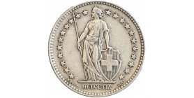 Avers : Helvetia debout vêtue d'une toge, appuyée contre un bouclier et tenant une lance