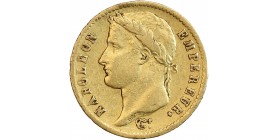 Avers : Tête laurée de Napoléon I à gauche, un ruban sur la nuque