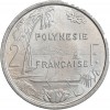 Revers : paysage polynésien avec cocotiers, voilier et pirogue à balancier