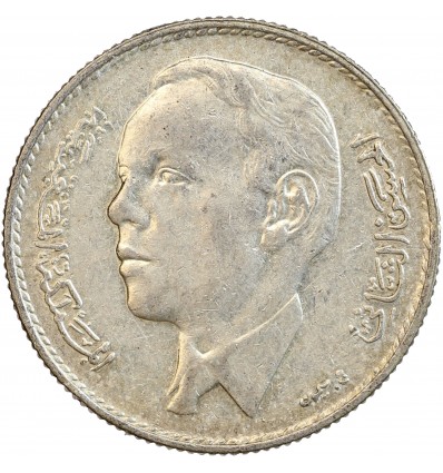 Avers : portrait de trois quart à gauche du roi Hassan II