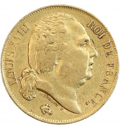 Avers : tête de Louis XVIII à droite.