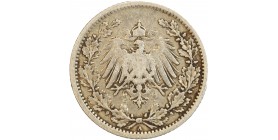 Avers : aigle héraldique couronné entre deux rameaux de chêne.