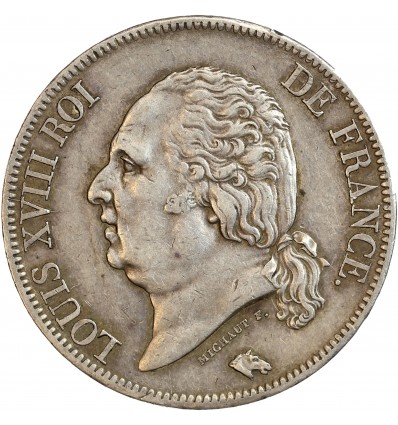 Avers : buste nu de Louis XVIII à gauche, cheveux noués sur la nuque