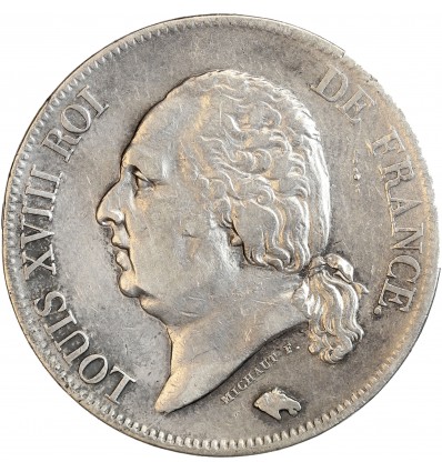 Avers : buste nu de Louis XVIII à gauche, cheveux noués sur la nuque