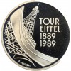 Revers : la Tour Eiffel vus de bas en perspective