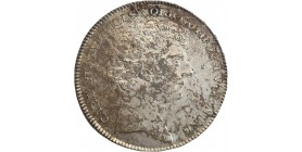 Avers : Tête du roi Charles XIV à droite.
