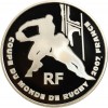 Avers : sylhouettes stylisées de deux joueurs de rugby devant les poteaux d'un terrain de rugby