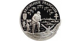 Avers : au centre scène de débarquement et parachutage